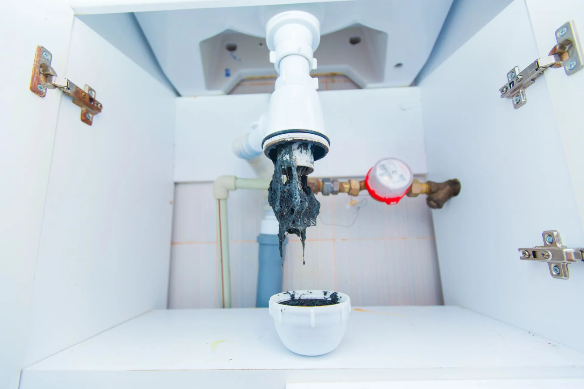 Professional drain cleaning service performing work